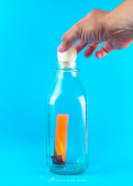 how to get a hard boiled egg into a bottle