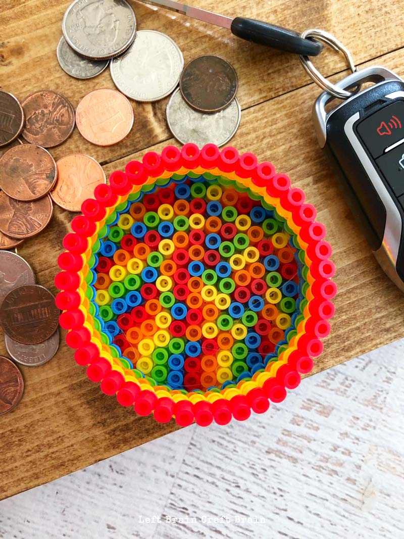 Homemade gifts are the best! Kids can make this colorful Perler Beads Change Holder as a fun homemade Christmas gift, homemade Father's Day gift, or homemade Mother's Day gift. No more lost coins! 