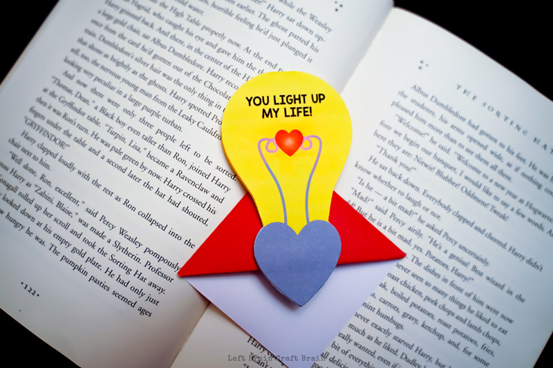 completed light up corner bookmark on open book