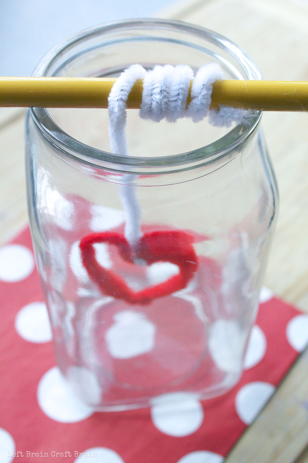 Drop the pipe cleaner heart into a jar