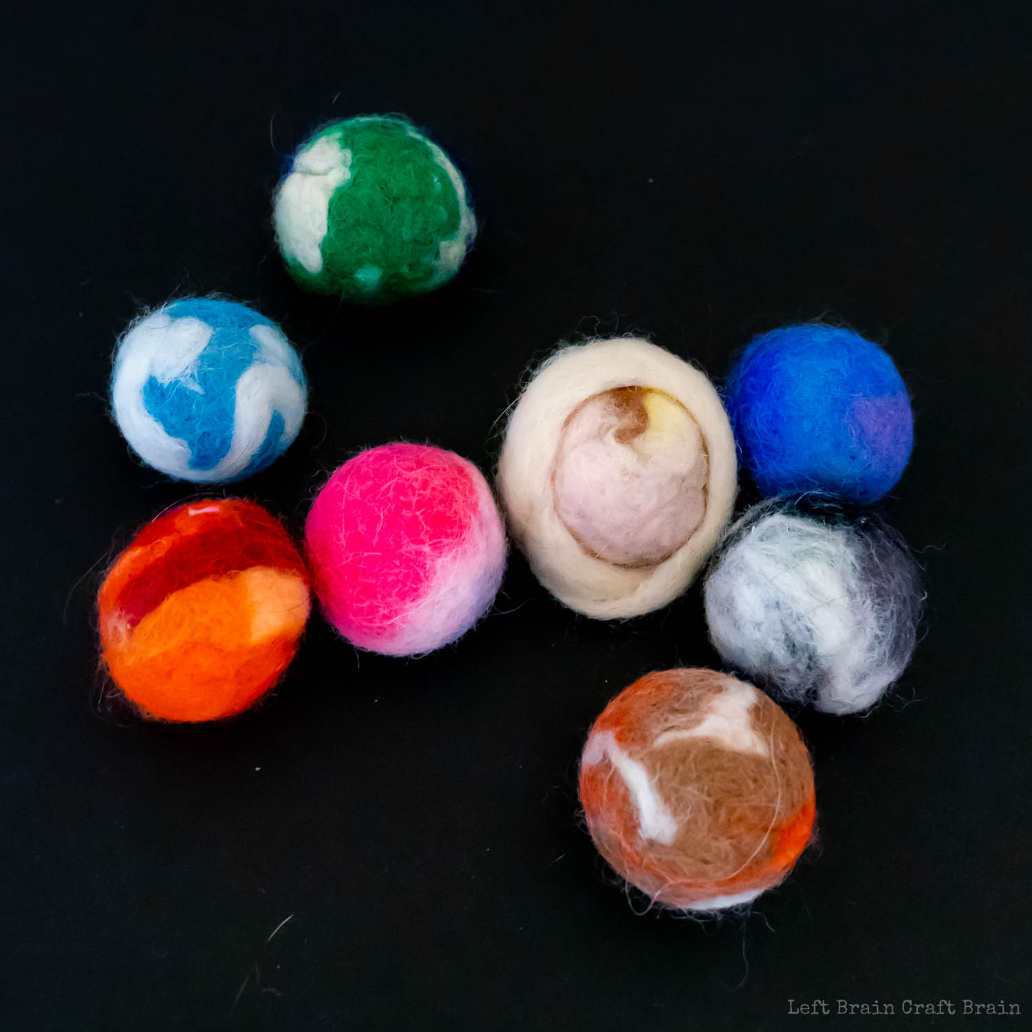 finished felted ball planets