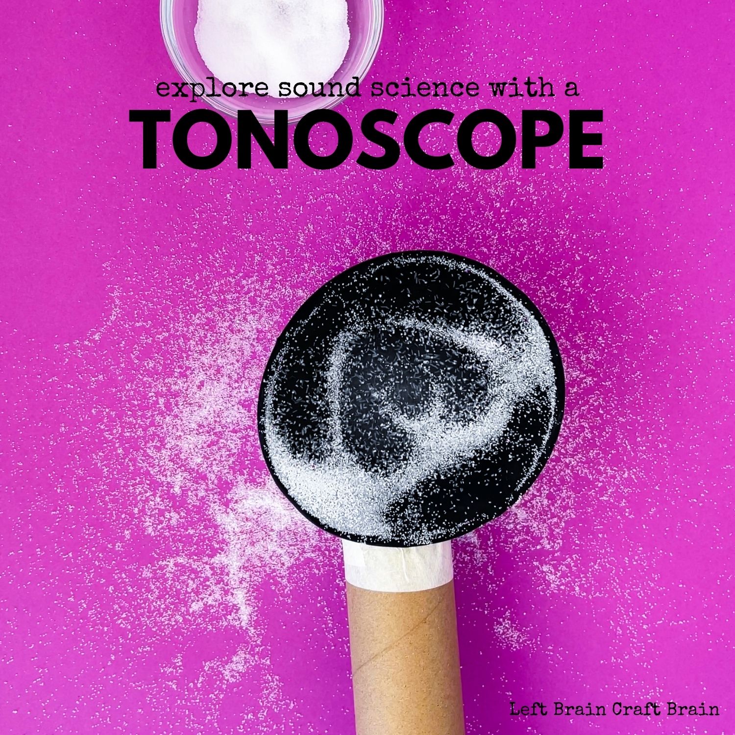 Explore sound science with a tonoscope, a device that helps you see sound vibrations. It's a super fun sound science experiment for kids. Purple background with paper towel roll that ends in a black circle covered with salt plus a small glass bowl of salt. Titles explore sound science with a tonoscope.