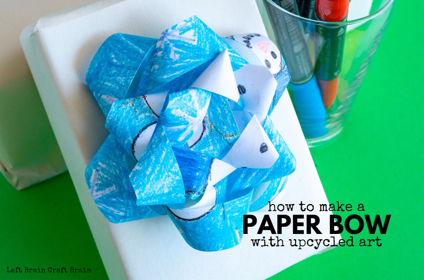 how to make a paper bow with upcycled art 1360x900